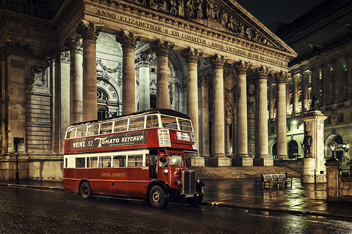 Vintage red London bus at the Royal Exchange