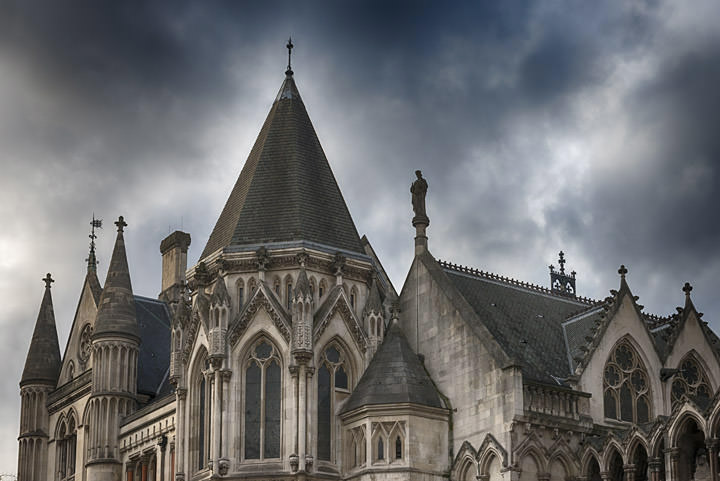 Royal Courts of Justice - storm clouds -London